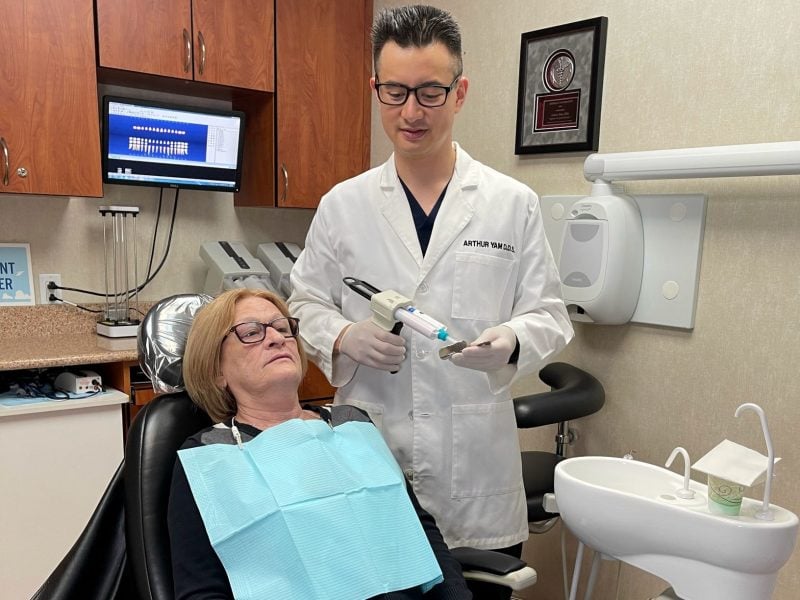 Dentist preparing to take impressions