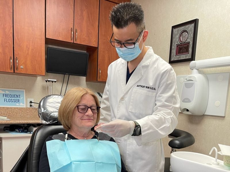 Dentures being placed