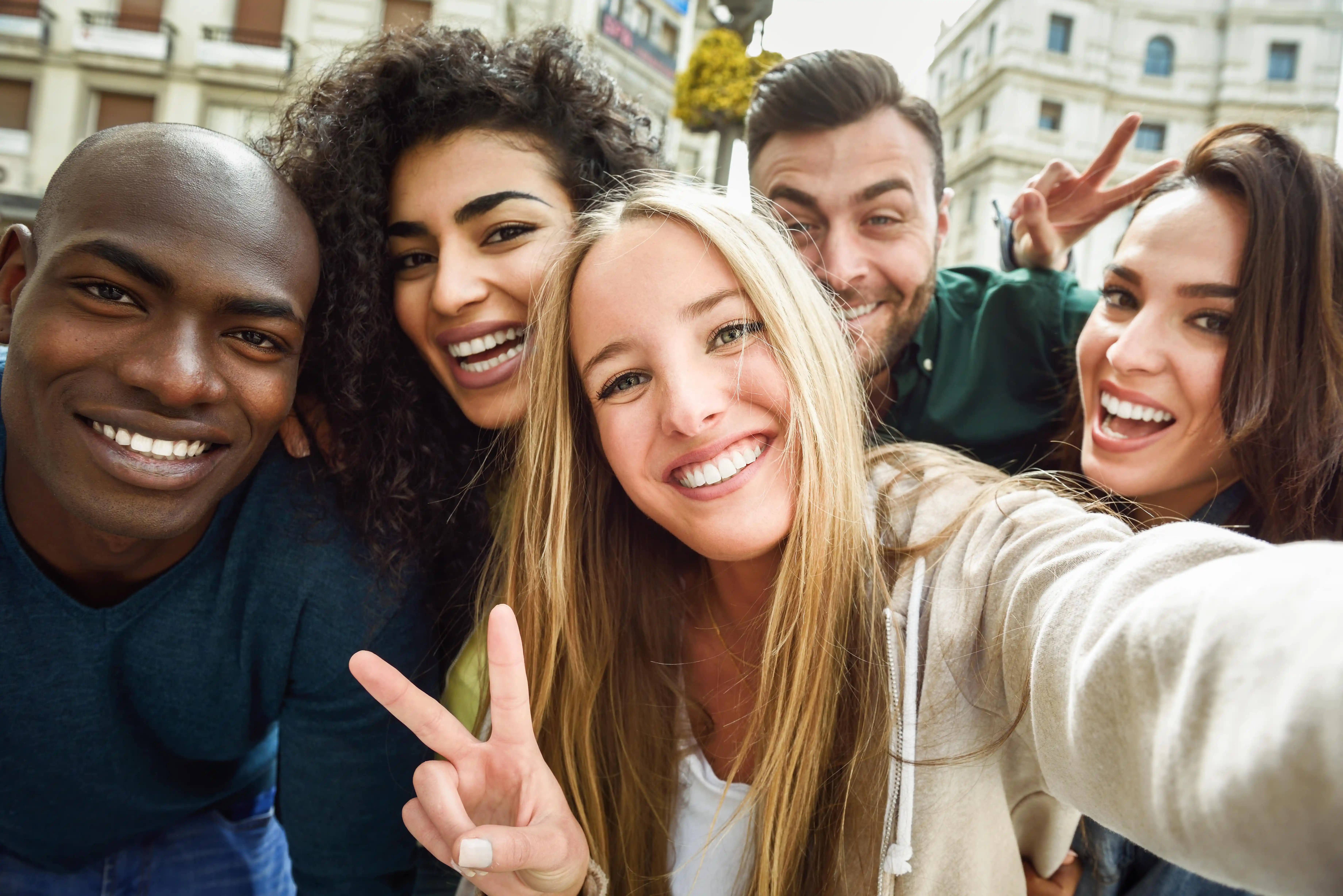 Young adult friends smiling