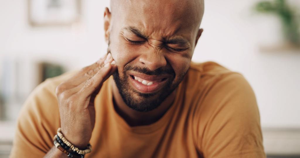 toothache sensitive man house dental problem